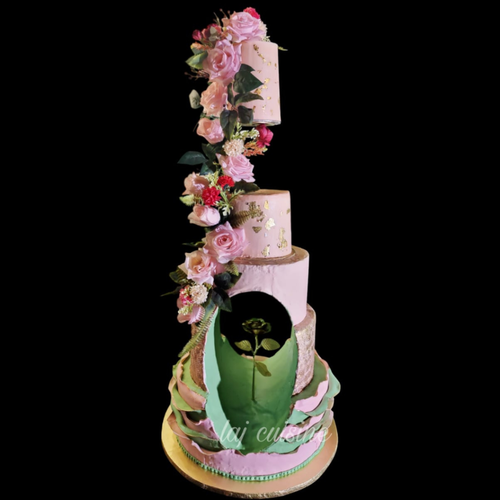 Gravity defining cake with fondant and artificial decorations 3500 per pound