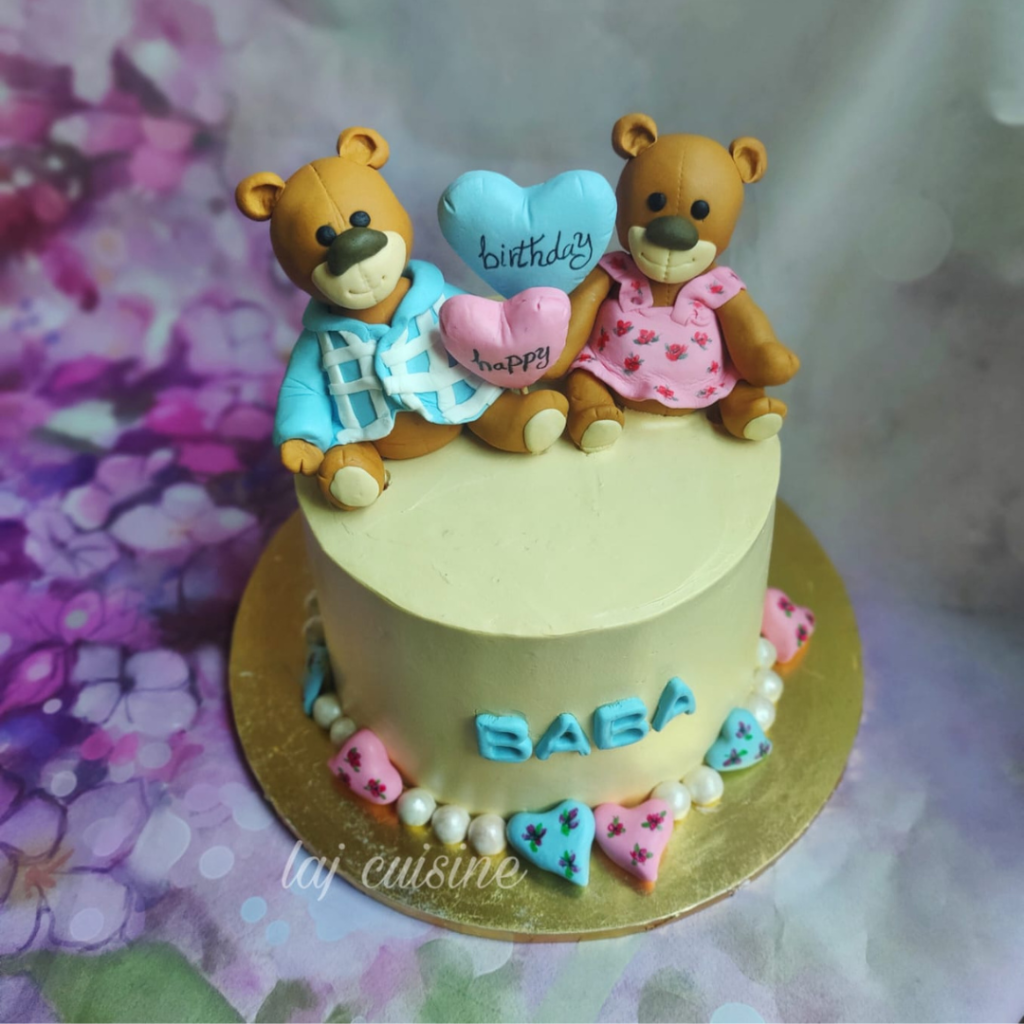 Fresh cream cake with fondant decorations 2300 per pound