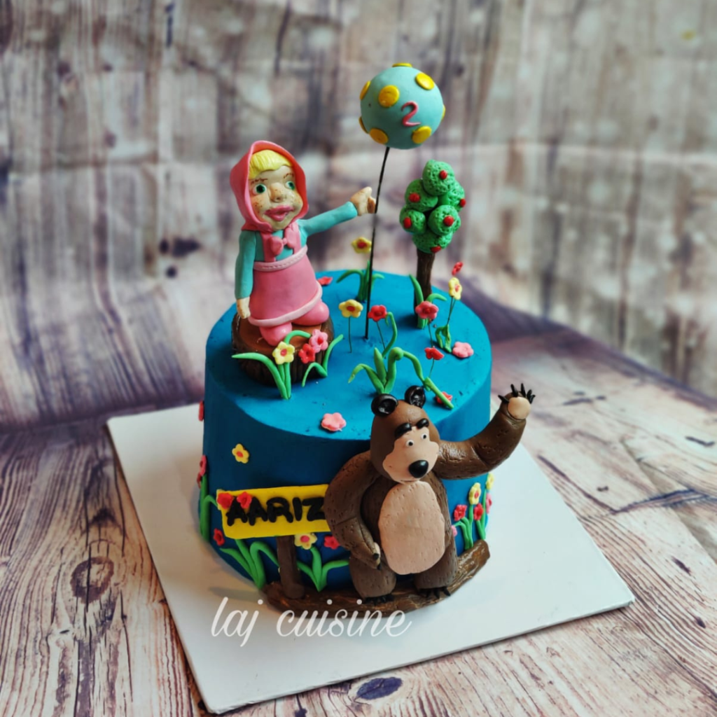 Fresh cream cake with fondant decorations 2300 per pound