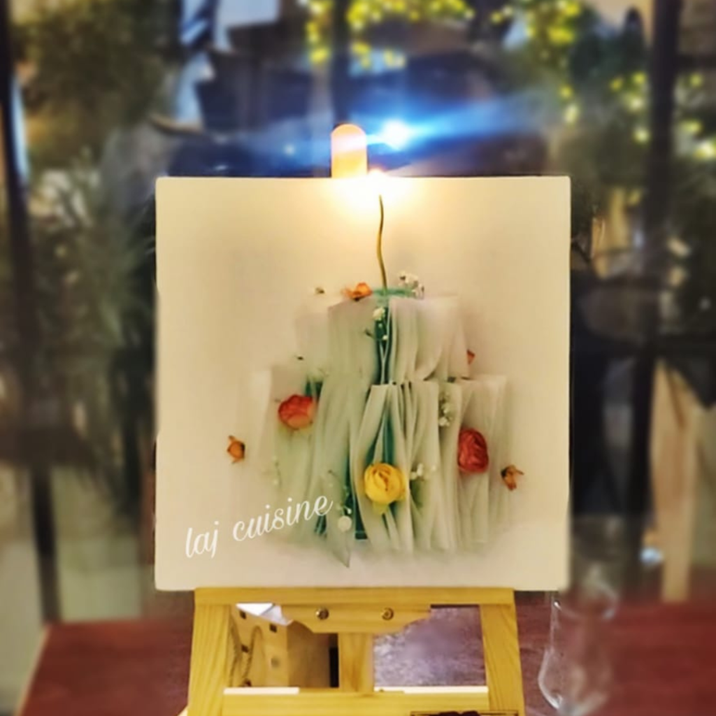 Cake on canvas with wafer paper decorations